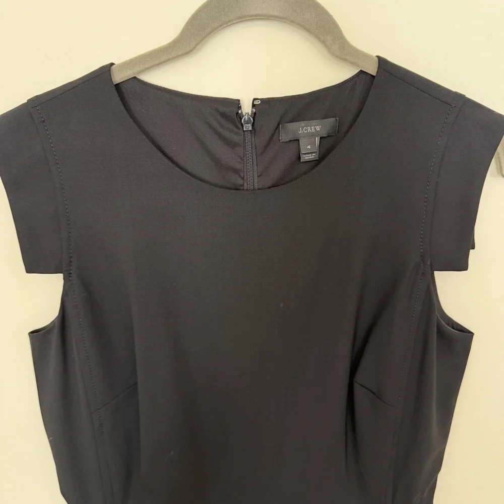 J. Crew Elegant Black Resume Dress. Pockets, back vent and zipper. Sleeveless.